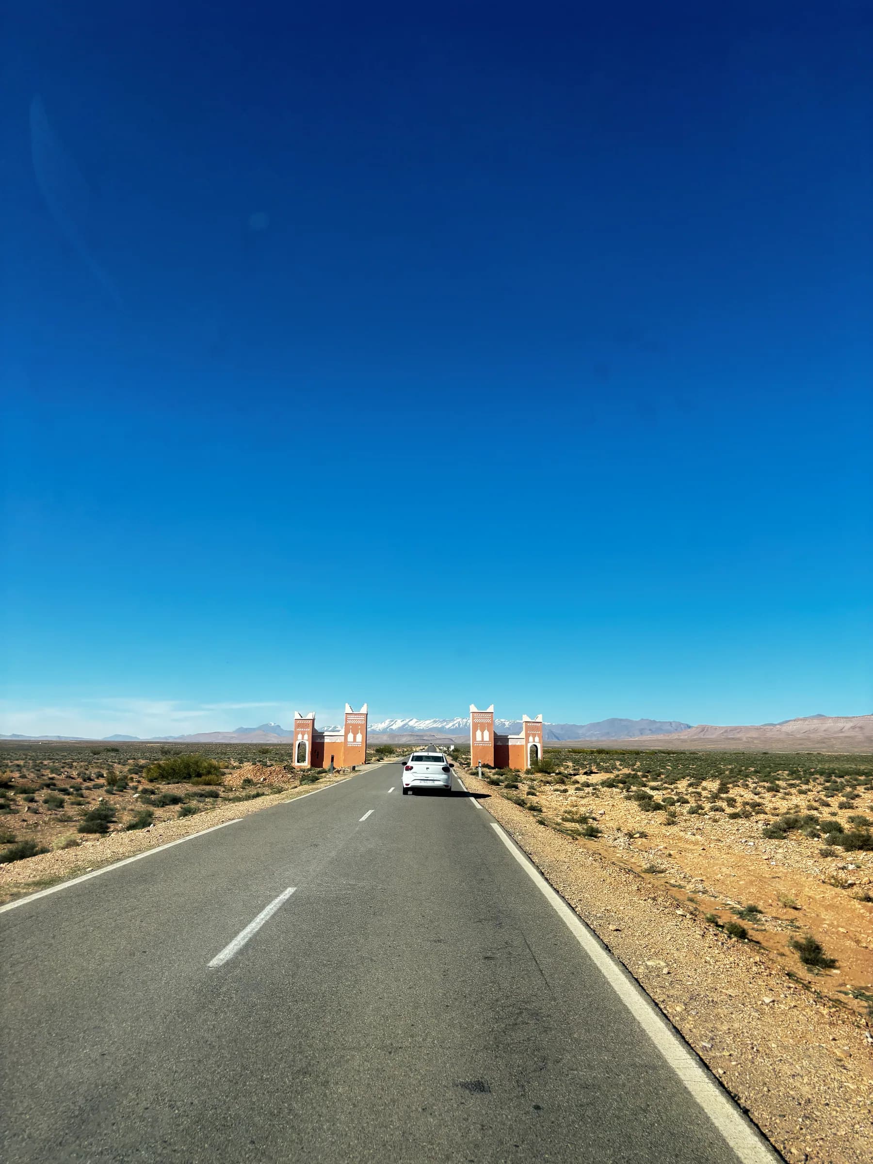Road approaching Morocco's desert landscape