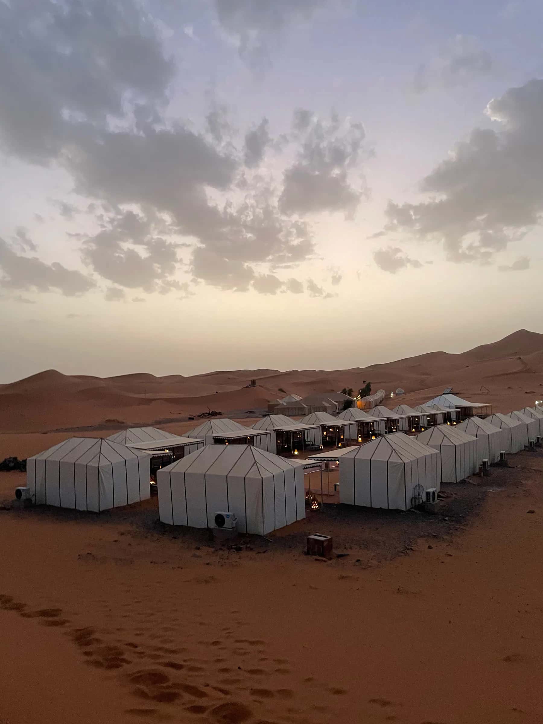 Sahara camp among desert dunes